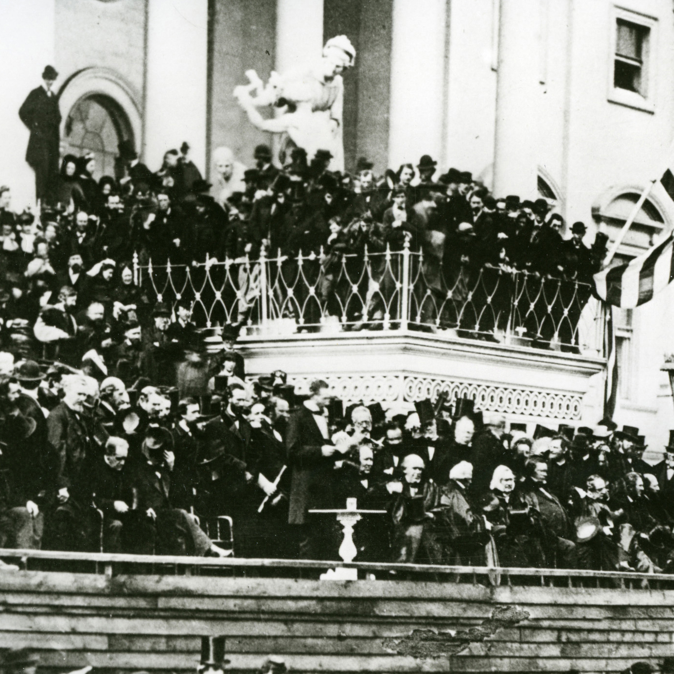Abraham Lincoln's second inaugural address. Lincoln stands in front of crowd on steps of capitol