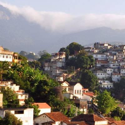 Houses covering the sides of mountains in Rio de Janeiro