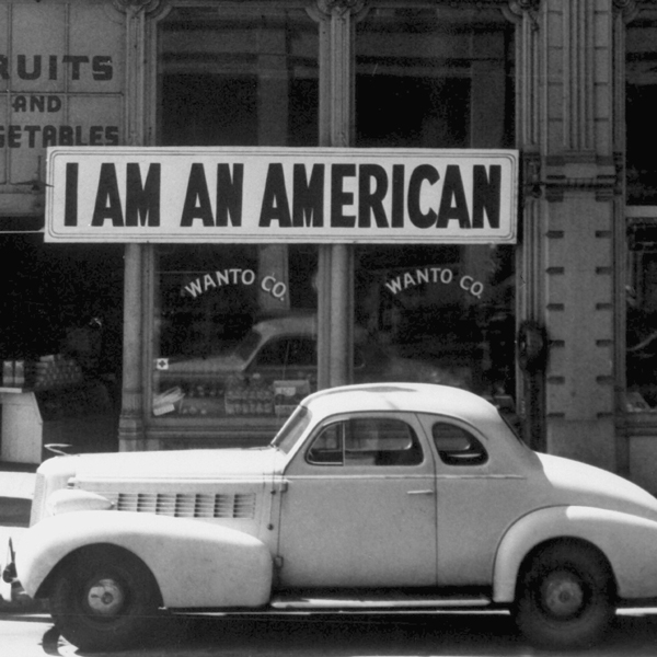 Storefront with a sign that says I am an American