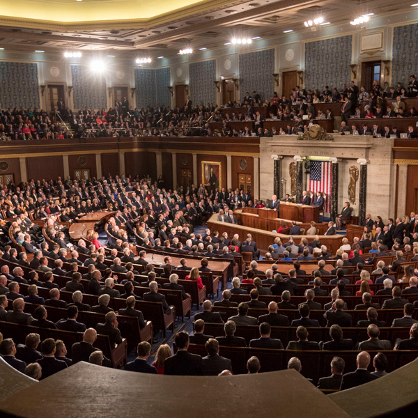 Donald Trump giving a State of the Union Address to a full house chamber