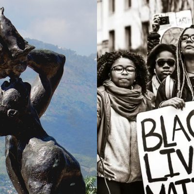 On the left, The Unknown Maroon statue. On the right, black lives matter protesters.