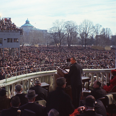 President Johnson giving an inaugural address in front of a large crowd