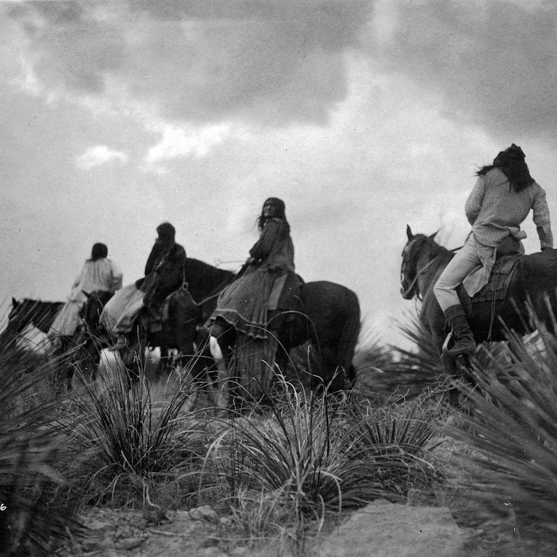 Apache people on horseback
