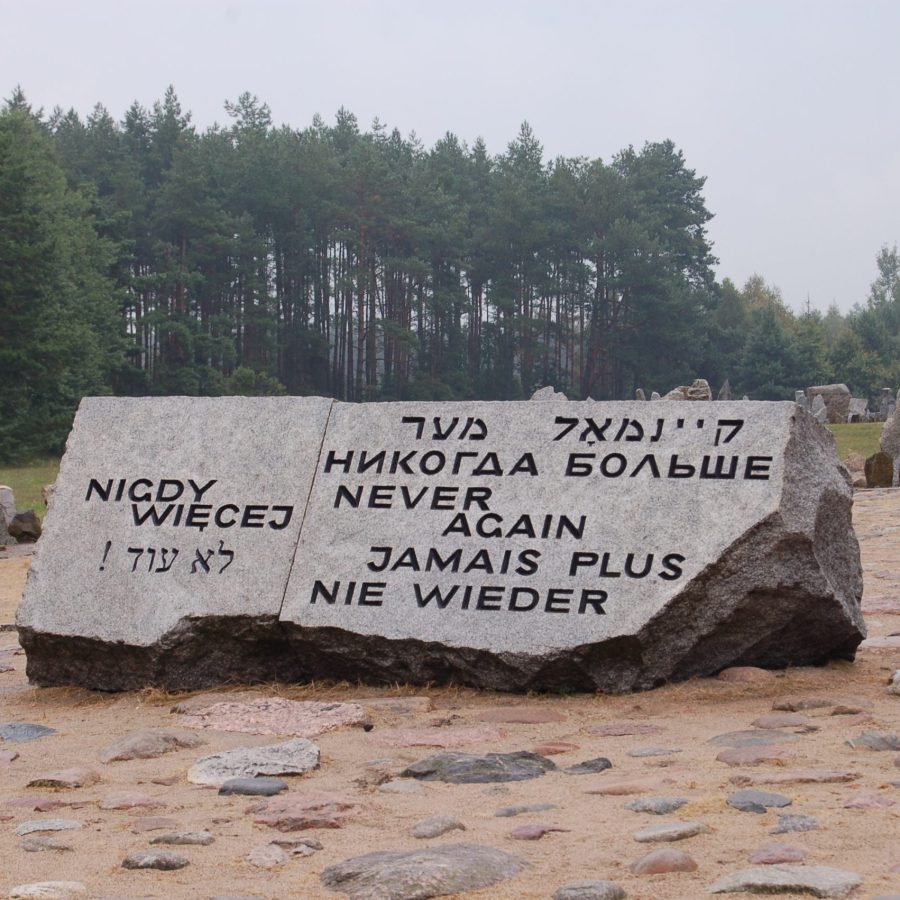 Holocaust memorial at Treblinka with a large rock inscribed with the worlds 
