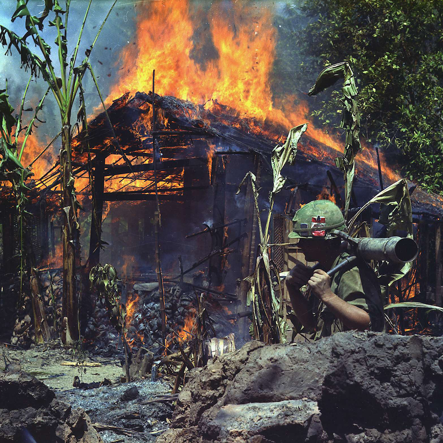U.S. troops burn alleged NFL buildings during the Vietnam War in 1968.